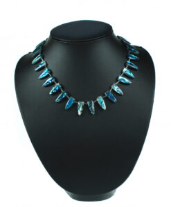 Pauaskjell triangler