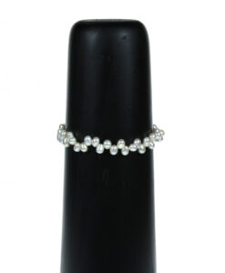 Perlearmbånd hvite dråper