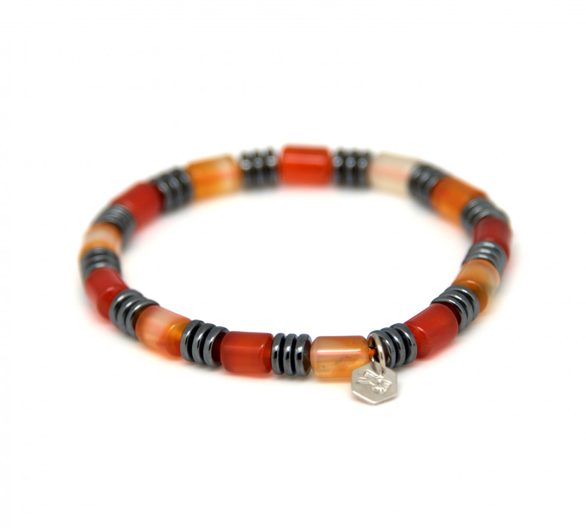 Karneol-trommer med hematitt  6x9mm.