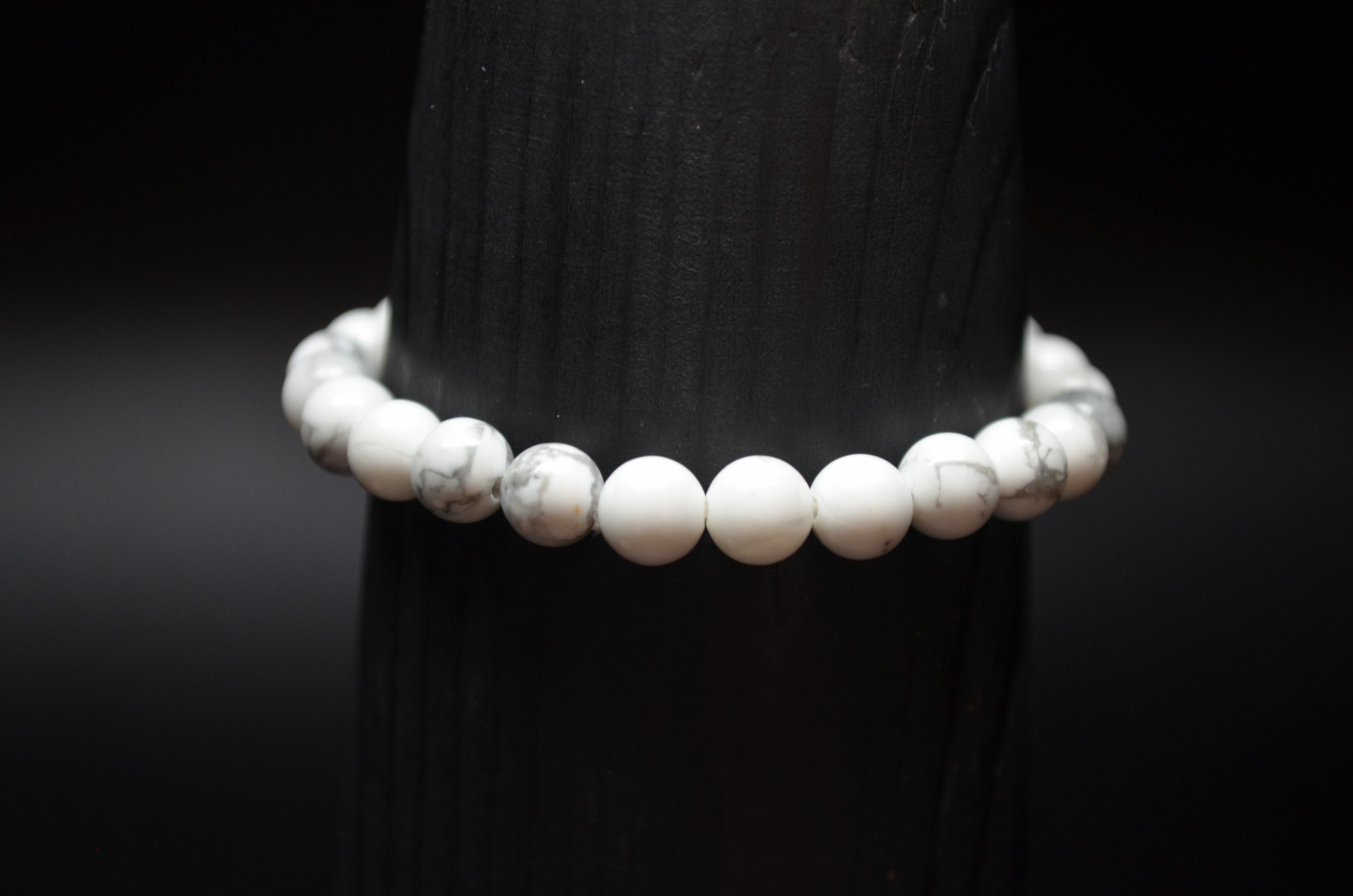 Barnearmbånd med hvitekuler