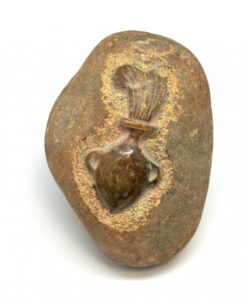 Stjernetegn vannmannen i elvestein