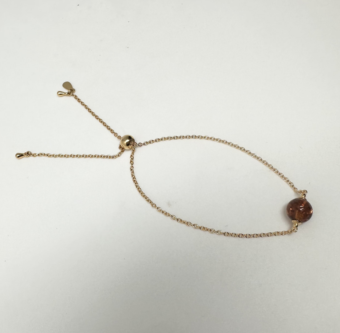 Rav kule på gullbelagt løkke-armbånd